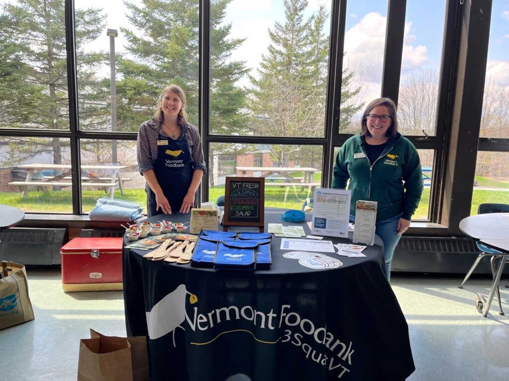 Jamie, left, and McKayla, members of our 3SquaresVT team, tabling at an event.