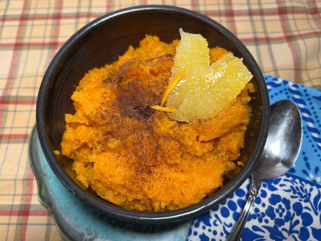 Photo of a bowl of mashed sweet potatoes.