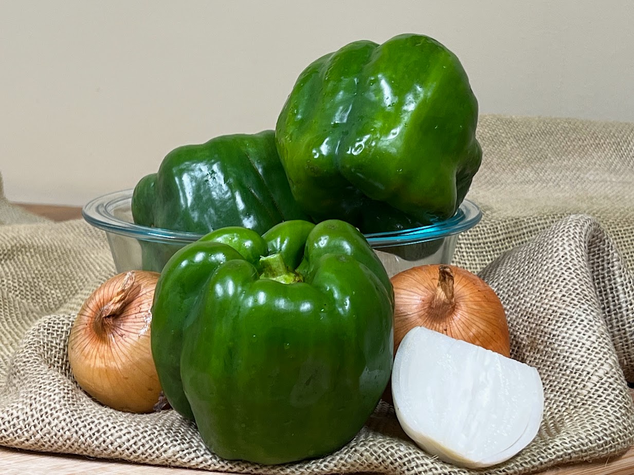 Photo of Bowl filled with peppers and onions